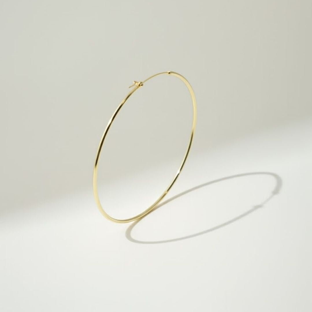 Elegante dunne grote gouden oorringen - verguld - stijlvol accessoire