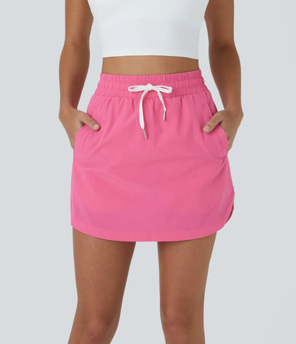 GOLFGLIDE Gonna - Mini con pantaloncini, coulisse in vita e tasche nascoste