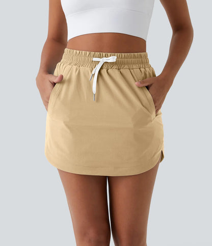 GOLFGLIDE Gonna - Mini con pantaloncini, coulisse in vita e tasche nascoste