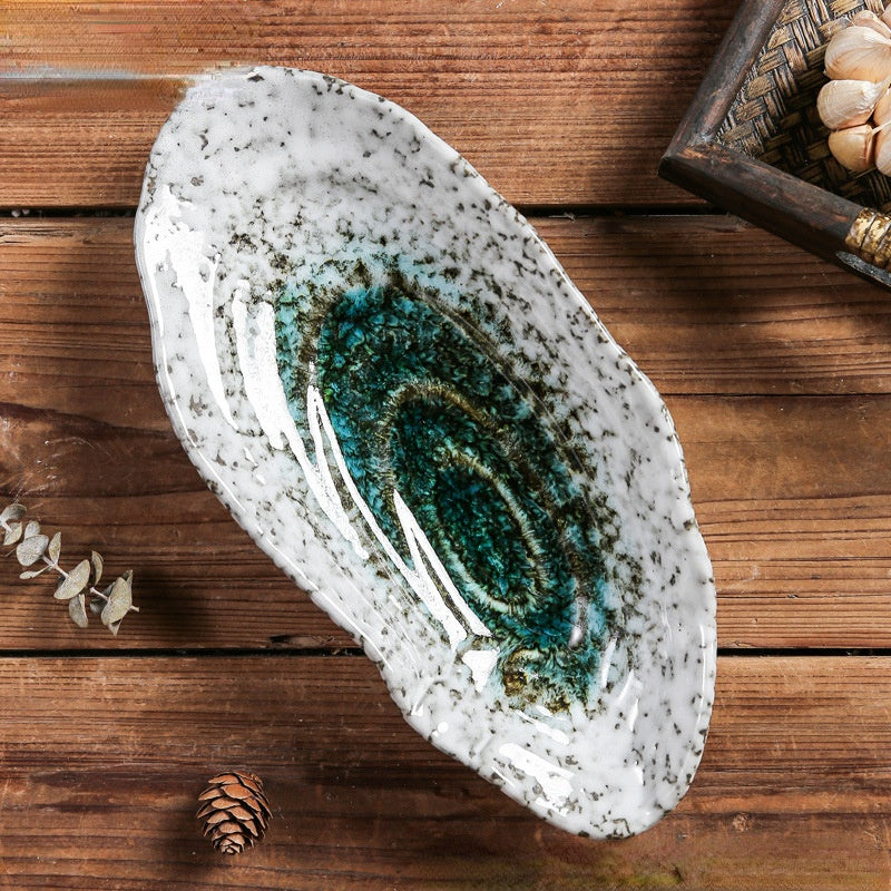 Shellora – Elegante vajilla de cerámica con forma de concha para una mesa con estilo