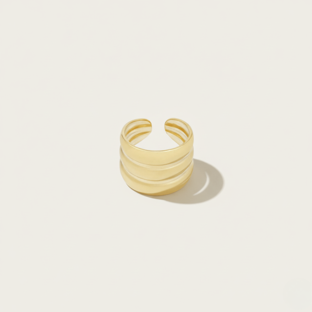 Anillo de nivel costero dorado