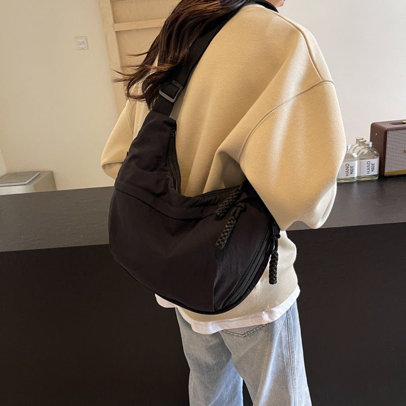 EVERCARRY – Sac à bandoulière en nylon avec compartiments intelligents pour un usage quotidien