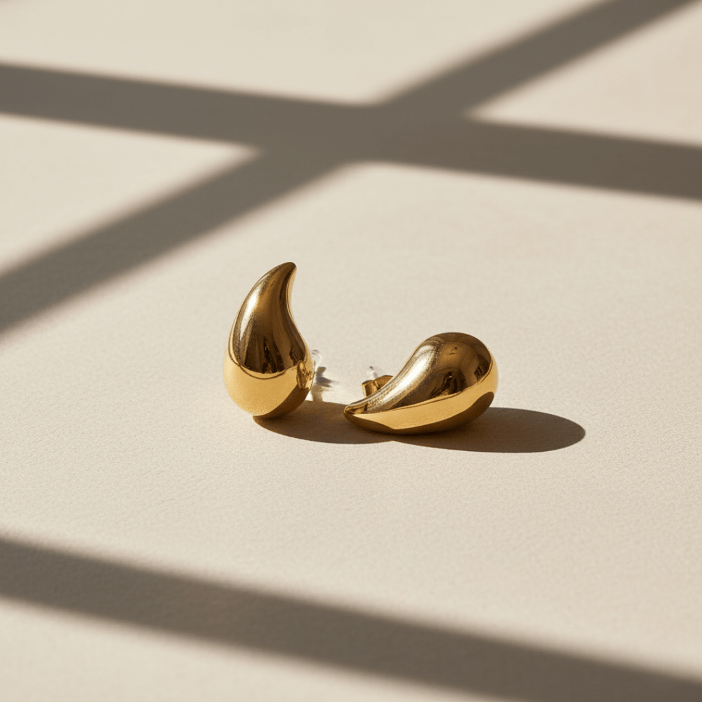 Dewdrop gouden en zilveren oorbellen