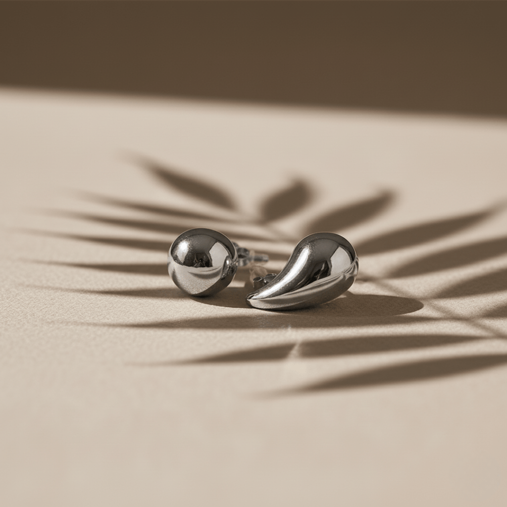 Dewdrop gouden en zilveren oorbellen