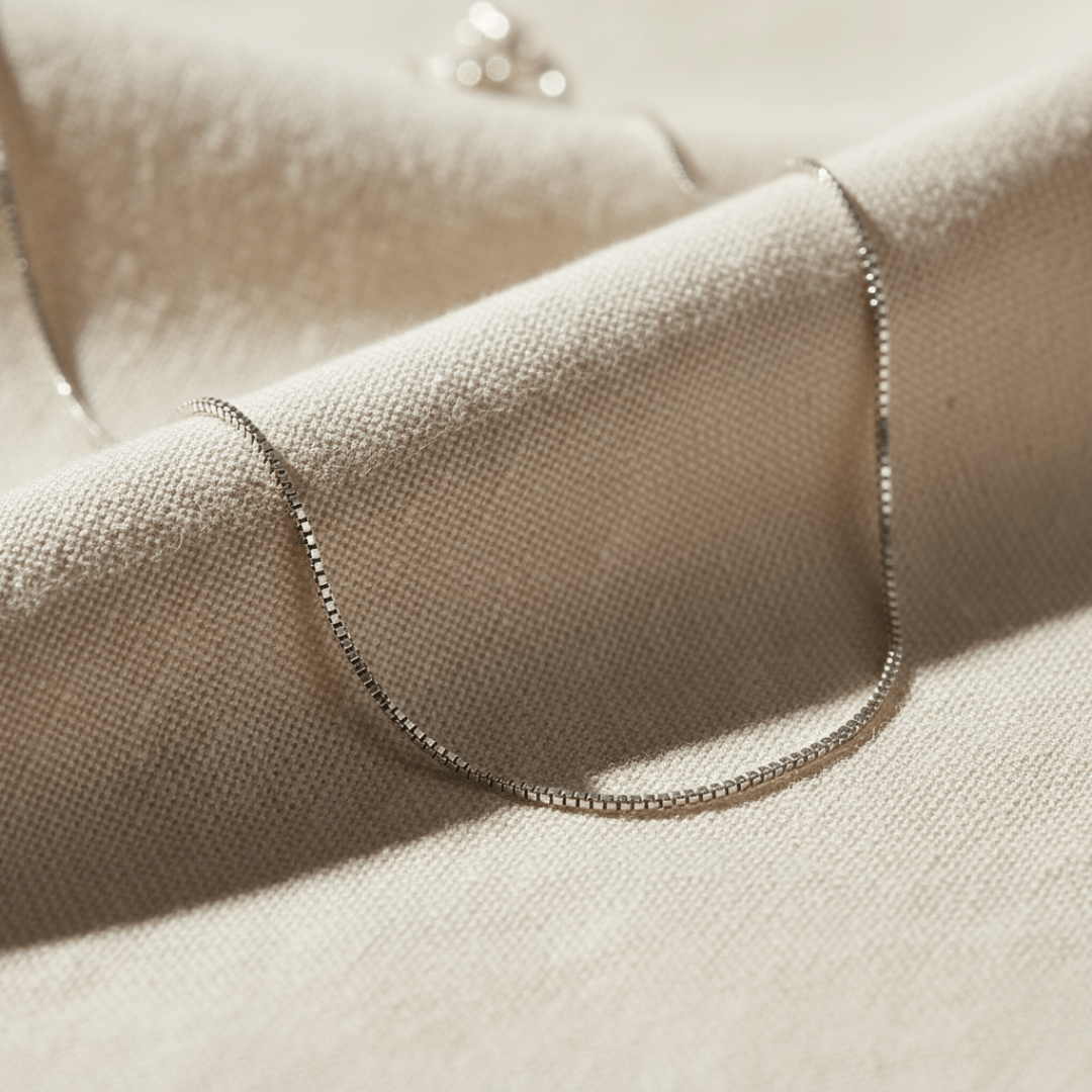 Elegante boxketting in goud en zilver