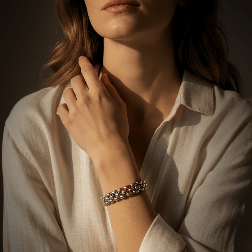 Elegante tweekleurige gouden armband - goud- en rhodiumgeplateerd stretchontwerp