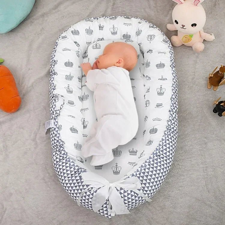 NapNest - Lit pliable pour bébé avec côtés respirants pour le voyage et la maison