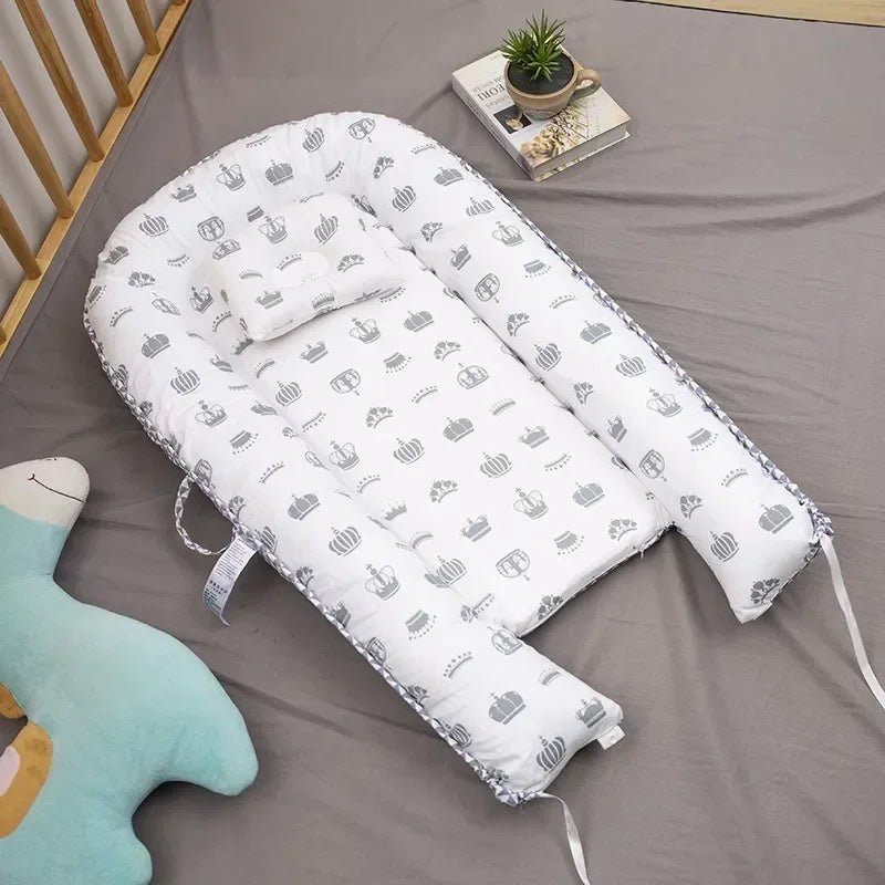 NapNest - Lit pliable pour bébé avec côtés respirants pour le voyage et la maison