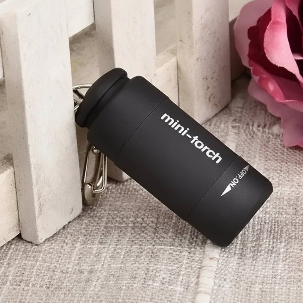 Compact LED Micro Pocket Flashlight - USB Rechargeable, Waterproof & Bright 7