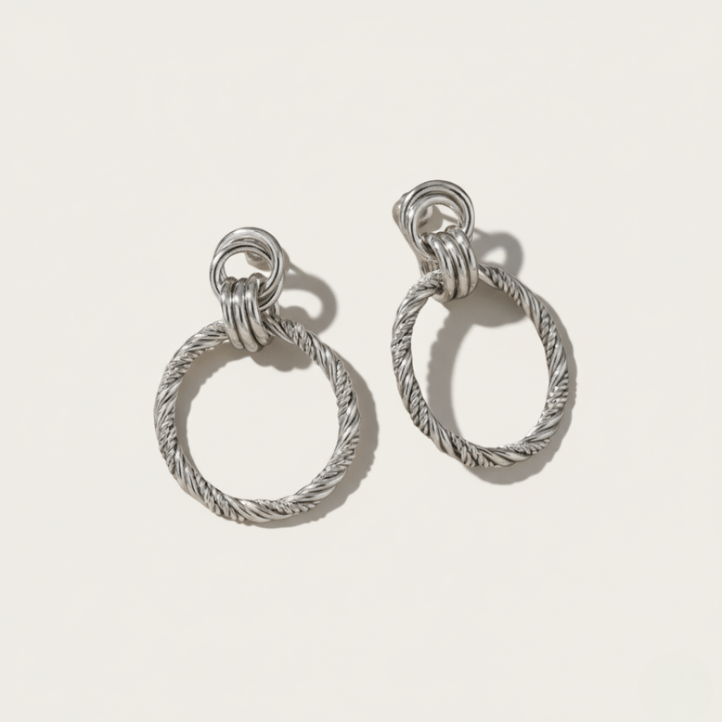 Relief gouden en zilveren statement oorbellen