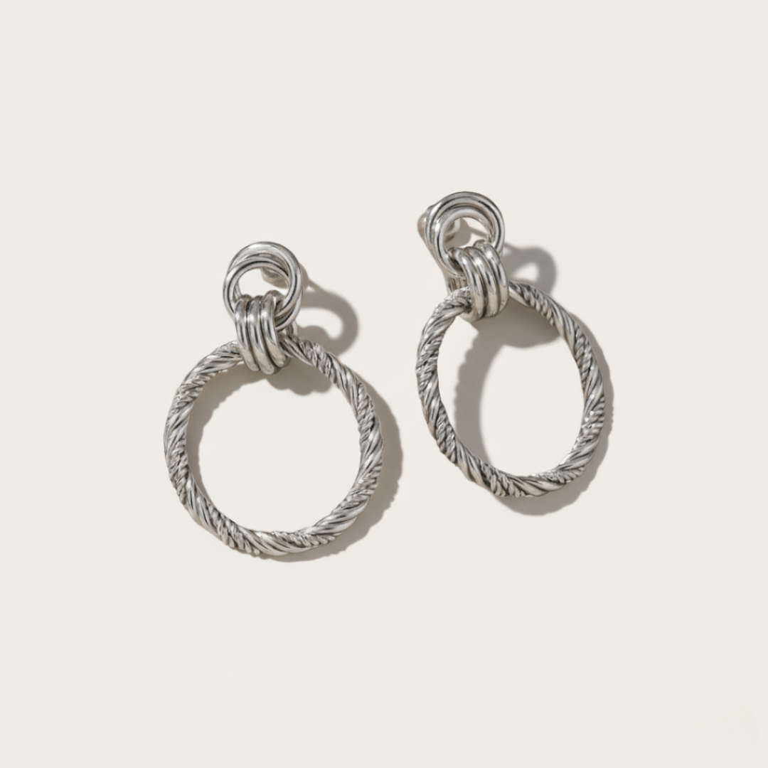 Relief gouden en zilveren statement oorbellen