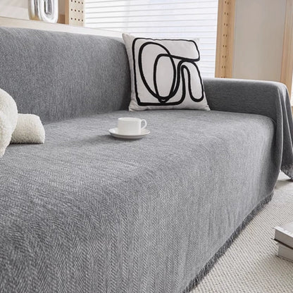 SofaShield – Housse de canapé minimaliste, étanche et facile à nettoyer